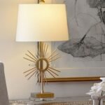 DISTRESSED GOLD SUNBURST SHAPED METAL TABLE LAMP