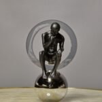 THINKER ON CHROME SPHERE SMALL