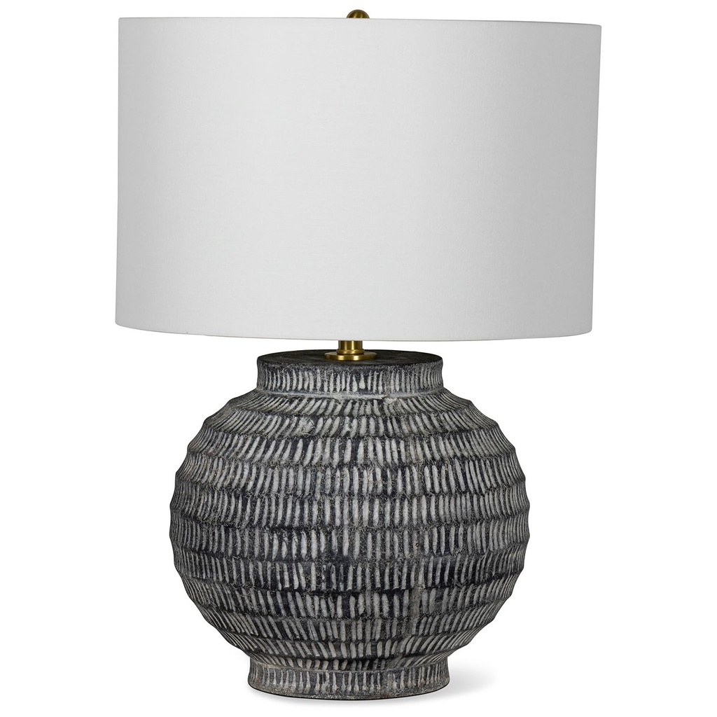 Bear sculpture — adobe brown chisel ceramic lamp beside a carved wood bear sculpture on a farmhouse living room console