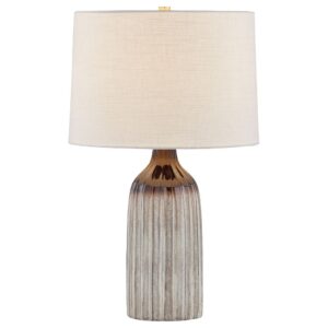 Sculptural table lamp — aged brass and ceramic Affogato lamp on a living room end table with cream shade in a transitional room