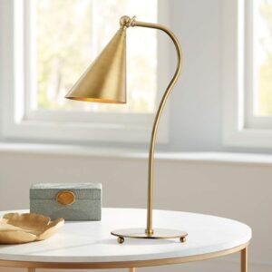 Abstract art sculpture — slim aged brass architectural table lamp as an abstract sculptural object on a contemporary living room console