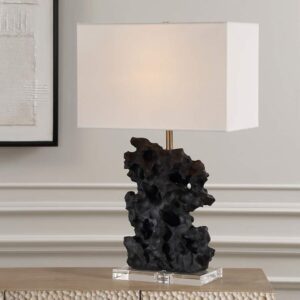 Before and after — unstyled table lamp on bare surface versus fully styled lamp vignette