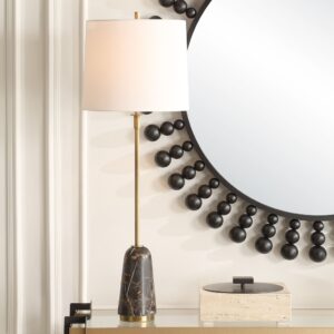 Smart plug with USB ports beside a ceramic table lamp on a styled bedside table — the alternative to a built-in USB lamp