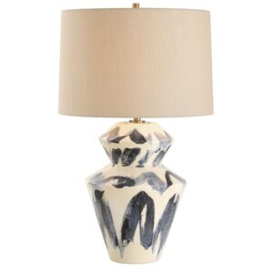 Before and after — dusty ceramic table lamp versus freshly cleaned lamp on a styled nightstand