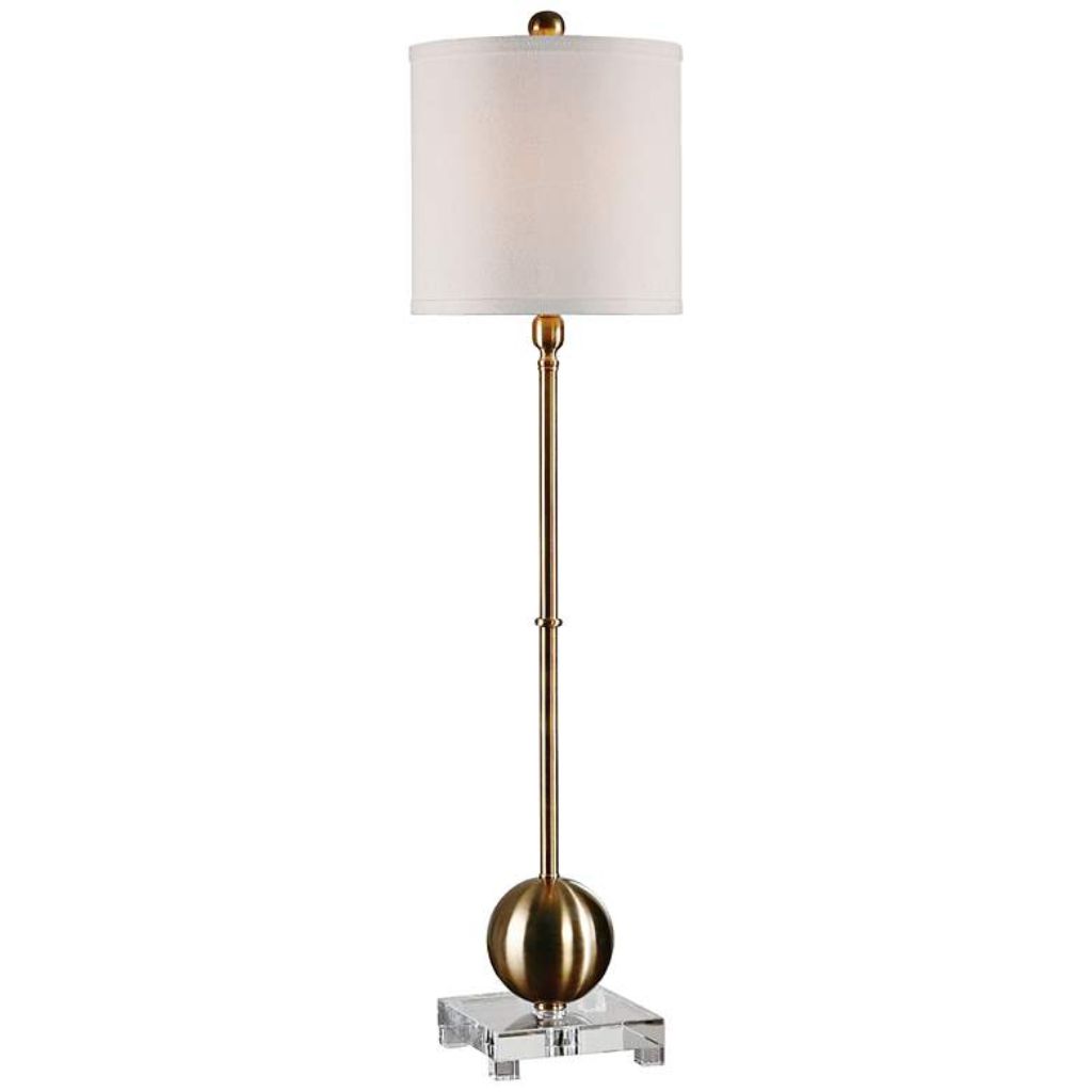 Oversized table lamps in a high-ceiling living room — 36-inch brass column lamps flanking a large sectional sofa