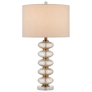 Compact mini ceramic table lamp on a small nightstand in a studio apartment bedroom