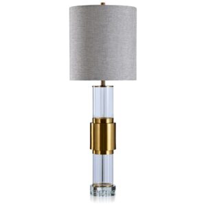 Oversized ceramic table lamp — wide proportioned base with large drum shade in a spacious contemporary living room