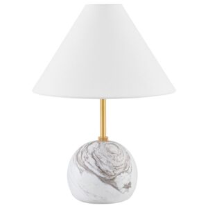 Cordless table lamp on a wall-mounted shelf replacing a nightstand in a tiny bedroom