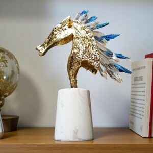 Sculpture material choice for home — granite ceramic lamp beside a ceramic sculpture showing long-term indoor material investment on a console