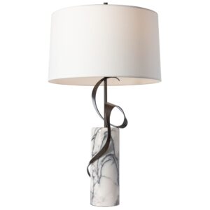 Side table lamp sizing guide — lamp too small versus correctly scaled beside a sofa end table