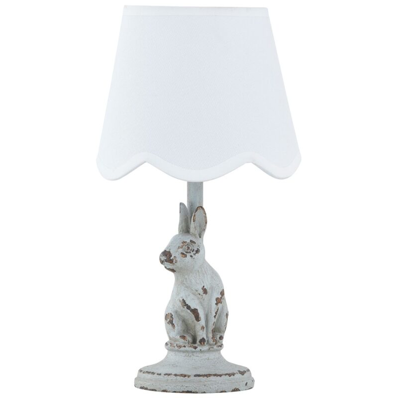 Mini table lamp collection — small ceramic, brass, and glass accent lamps displayed on a bookshelf and compact nightstand