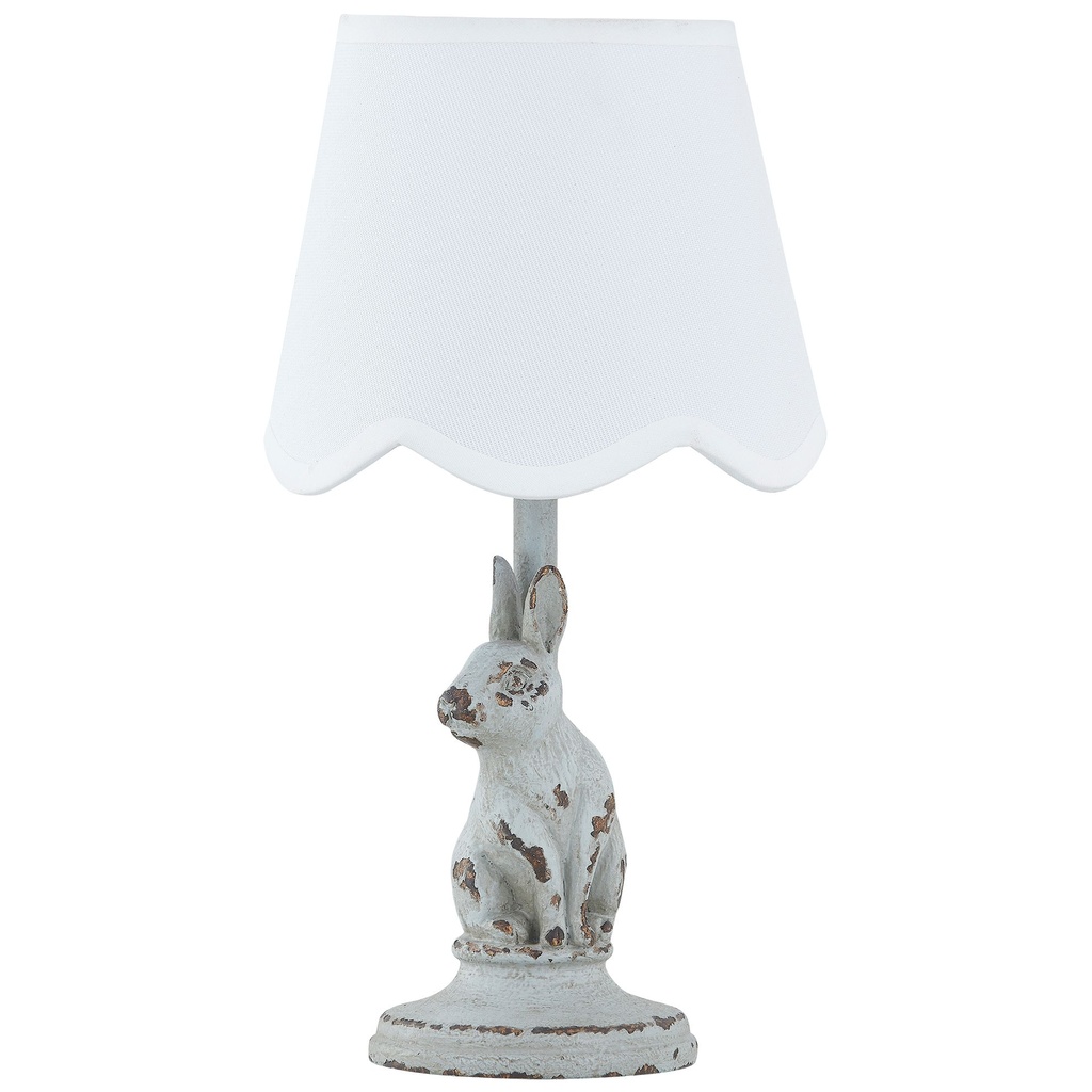 Mini table lamp collection — small ceramic, brass, and glass accent lamps displayed on a bookshelf and compact nightstand