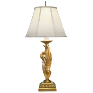 Baroque sculpture style interior design — warm ombre ceramic lamp beside a baroque figurine on a formal console in a dramatically lit traditional room