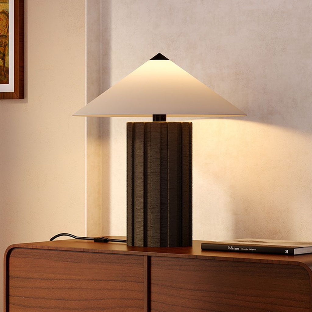 Lantern table lamp in aged iron on a foyer console — grand heritage first impression at the entryway door