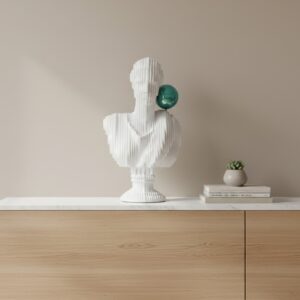 Marble sculpture for home interior design — gold leaf statement lamp beside a marble figurine on a formal console in a classical-inspired living room