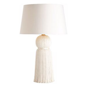 40-inch tall table lamp in aged brass metal on a large nightstand in a master bedroom with high ceilings