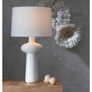 Bedside table lamp USB charging setup — lamp, phone, and tablet charging from a single outlet with USB smart plug