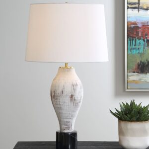 Aged brass dome adjustable desk lamp from Exotic Decor USA positioned for reading at a bedroom nightstand