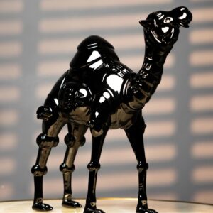 Sculpture home decor trends for 2025 — gold leaf statement lamp as primary sculptural object in a room that understands the 2025 principle of considered permanence