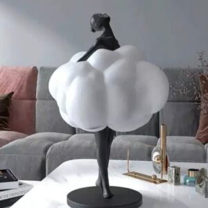 Modern sculpture movements for home collectors — aged black lamp as minimal domestic companion beside MCM organic sculpture in a contemporary Japandi room