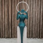 Biophilic design sculpture for home interiors — sage green ceramic lamp as biophilic art object in a nature-connected interior