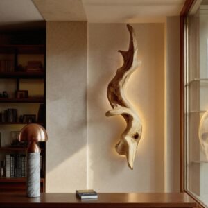 How to make a clay sculpture at home step by step — adobe brown chisel lamp on a home studio worktable with clay, tools, and a work-in-progress sculpture