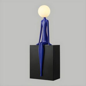Floor lamps for living room — abstract blue resin LED floor lamp as a sculptural statement lamp creating vertical ambient light in a contemporary living room