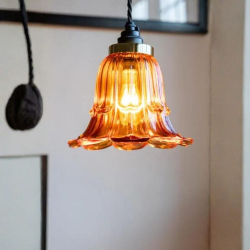 Crystal Chandeliers: Traditional Glamour and How to Style Them — Amber Tiered Glass Ceiling Shade showing key characteristics