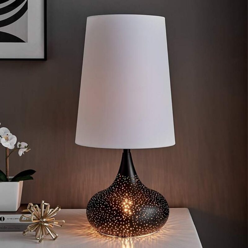 Table lamps for home office — aged brass dome adjustable lamp on a desk showing directed task light with warm brass aesthetic