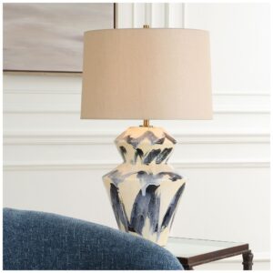 Bedroom lighting layers — pale blue ceramic bedside lamp as the task and ambient layer in a bedroom lighting system