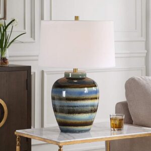 How to layer lighting in a room — Zeus gold leaf lamp as the primary mid-level ambient table lamp layer in a living room with recessed and floor lamp complement