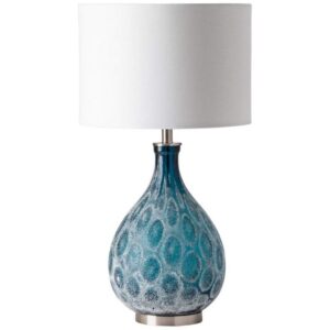Table lamps for small spaces — natural beige slim lamp at correct scale for a small bedroom nightstand showing how minimal form preserves space