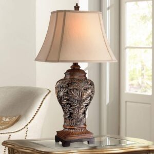 Luxury table lamps — Zeus gold leaf lamp showing the material quality, proportional refinement, and surface finish that defines luxury table lamp design