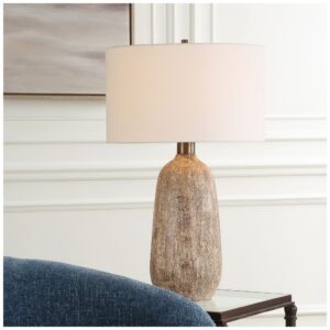 Luxury table lamps bedroom — cobalt glass lamp creating the private luxury of a jewel-palette bedroom with amber nighttime glow