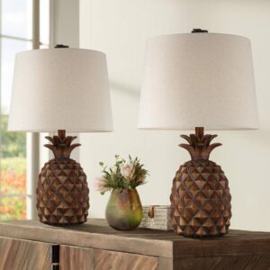 Table lamp color bold — cobalt brass lamp showing how a bold color lamp anchors a blue accent theme when connected to other blue room elements