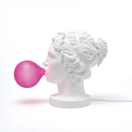 Close-up of the frosted pink LED bubble at the lips of the white goddess bust lamp