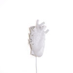 Close-up of sculpted valves and arteries on the white heart wall lamp
