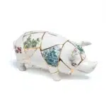 Side view of gold seam piggy bank form