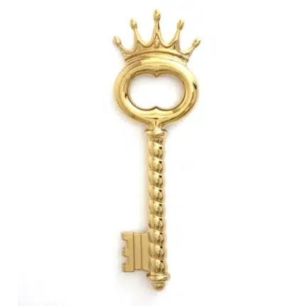 Gold power key sculpture in tall porcelain