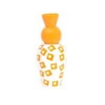 Decorative lidded vase styled in an entryway