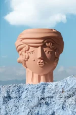 Side view of the terracotta woman vase silhouette