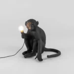 Table Lamp Monkey Sitting Black, close-up detail of the resin finish