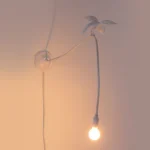 Wall Lamp Sparrow Cruising, shown mounted in a hallway
