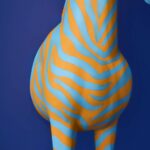 Floor Lamp Zebra Print Blue and Orange, shown illuminated in a living room setting