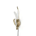 Wall Lamp Banana Gold, shown mounted in a living room