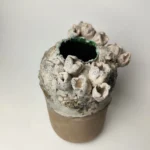 Textured vase, alternate angle showing three surface zones