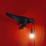 Table Lamp Raven Black Looking Right, full front view of the raven sculpture