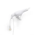 Table Lamp Raven White Looking Left, full front view of the raven sculpture