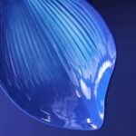 Wall Lamp Flower Blue, close-up detail of the blue resin finish
