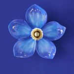 Wall Lamp Flower Blue, illuminated view showing the indirect glow
